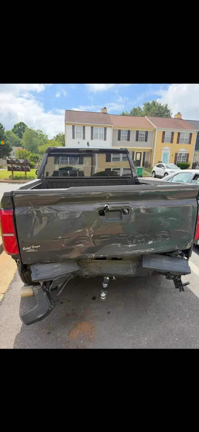 Green truck — collision before — Stop N Go auto body & paint, Stone Mountain GA