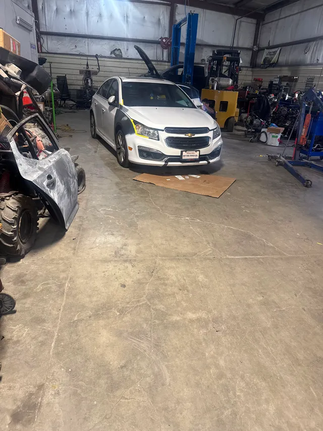White sedan — collision progress — Stop N Go auto body & paint, Stone Mountain GA