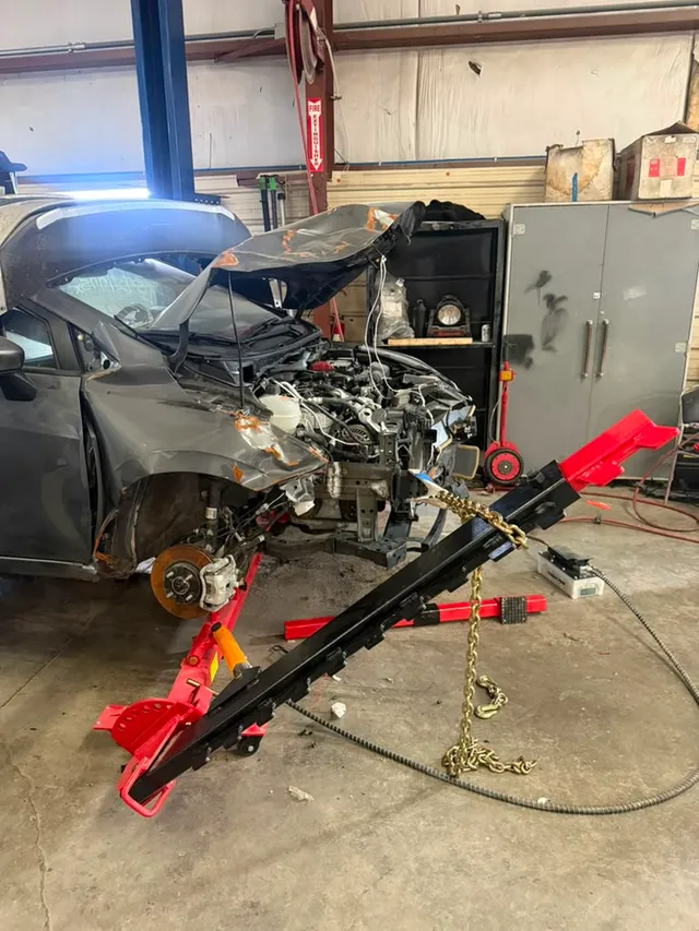 Gray coupe — collision before — Stop N Go auto body & paint, Stone Mountain GA