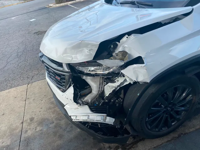 White suv — collision before — Stop N Go auto body & paint, Stone Mountain GA