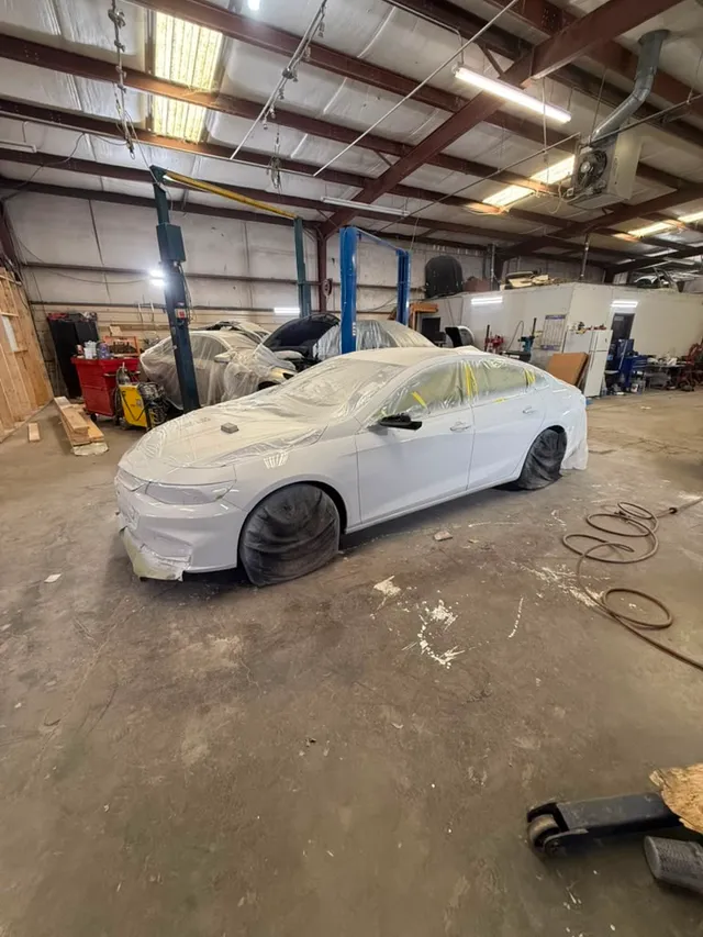 White sedan — painting progress — Stop N Go auto body & paint, Stone Mountain GA