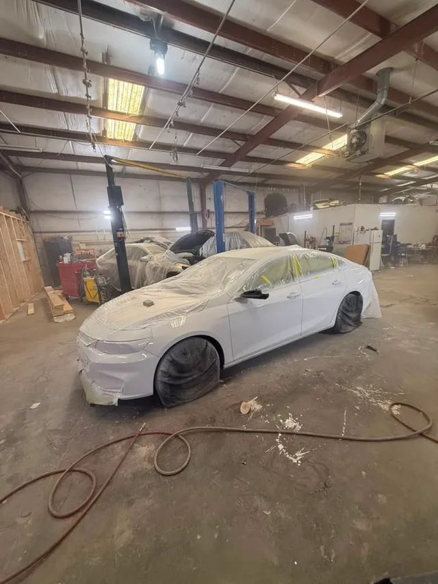 White sedan — painting progress — Stop N Go auto body & paint, Stone Mountain GA
