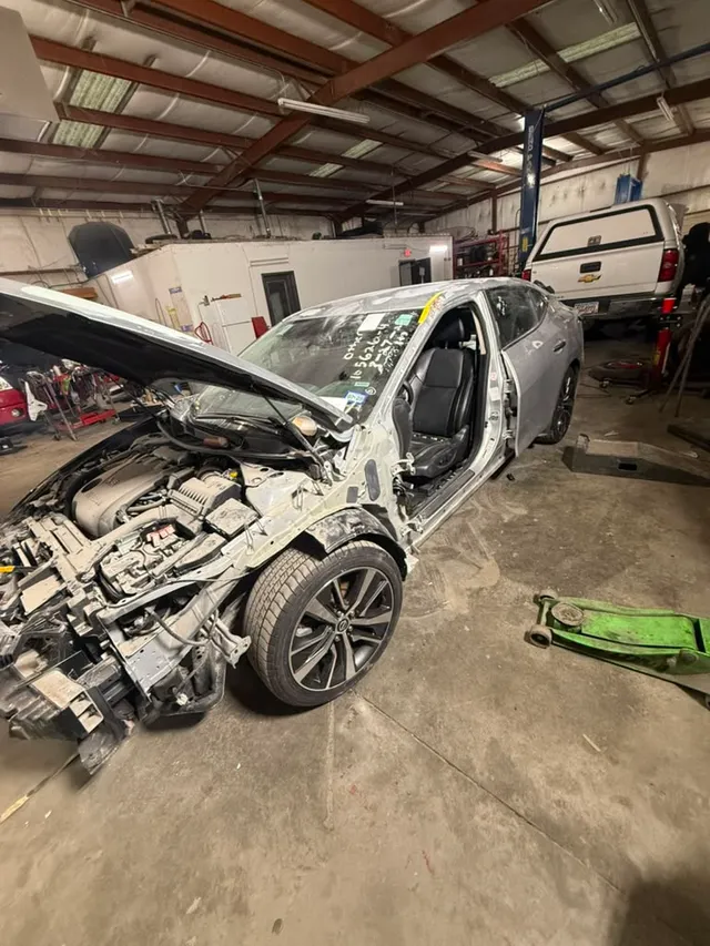 Silver sedan — collision before — Stop N Go auto body & paint, Stone Mountain GA