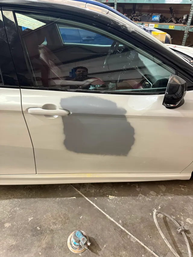 White sedan — spot before — Stop N Go auto body & paint, Stone Mountain GA