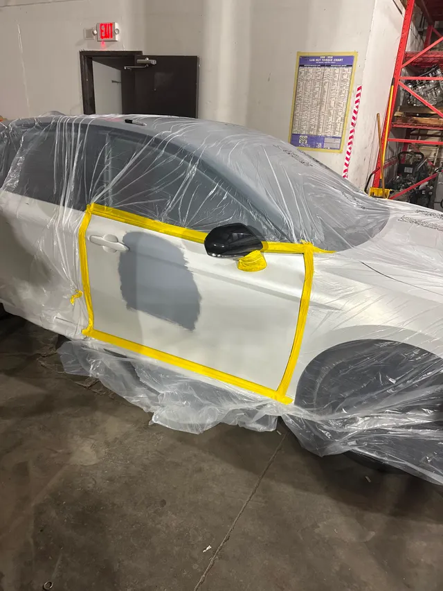 White sedan — painting before — Stop N Go auto body & paint, Stone Mountain GA